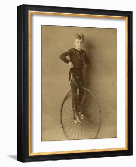 Child on a Unicycle, Late 19th Century-G. & R. Lavis-Framed Photographic Print