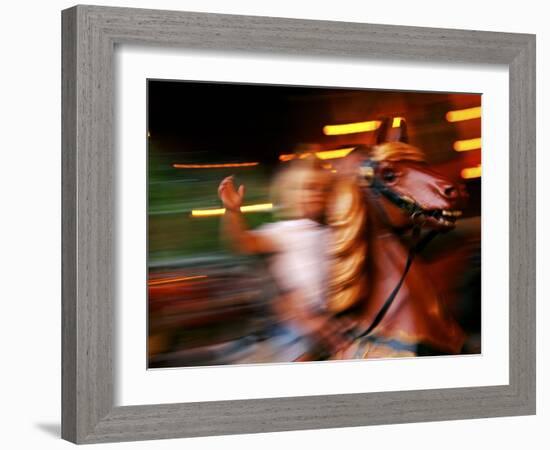 Child on Carousel at Grona Lund Amusement Park, Stockholm, Sweden-Nancy & Steve Ross-Framed Photographic Print