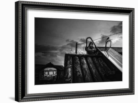 Child on Slide-Clive Nolan-Framed Photographic Print