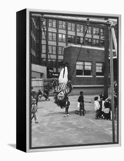 Child on Swings in Playground at the KLH Day Care Center-Leonard Mccombe-Framed Premier Image Canvas