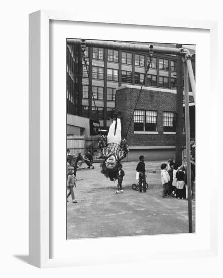 Child on Swings in Playground at the KLH Day Care Center-Leonard Mccombe-Framed Photographic Print