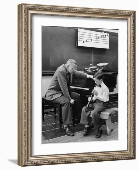 Child Playing Various Musical Instruments-Nina Leen-Framed Photographic Print