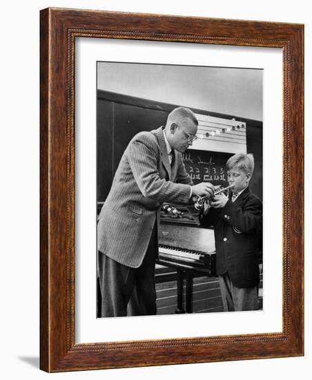 Child Playing Various Musical Instruments-Nina Leen-Framed Photographic Print