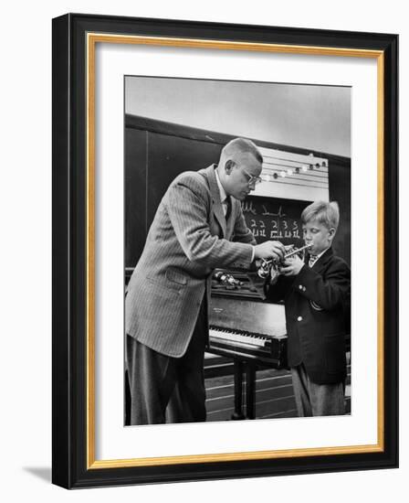 Child Playing Various Musical Instruments-Nina Leen-Framed Photographic Print