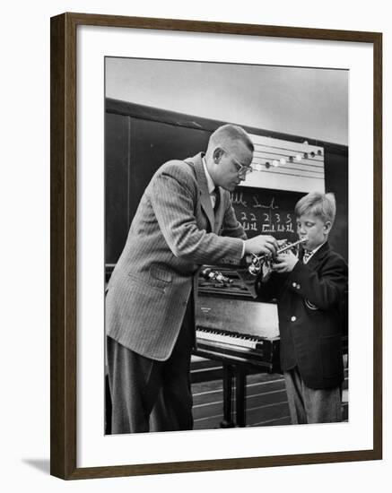 Child Playing Various Musical Instruments-Nina Leen-Framed Photographic Print