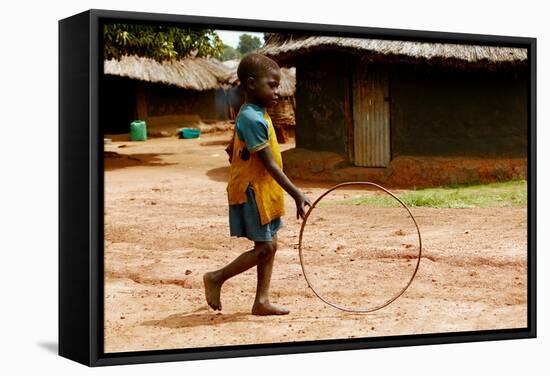 Child Playing-Mauro Fermariello-Framed Premier Image Canvas