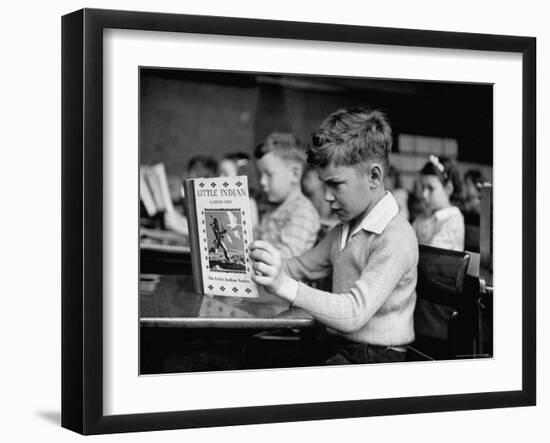 Child Reading a Book in School-Frank Scherschel-Framed Photographic Print