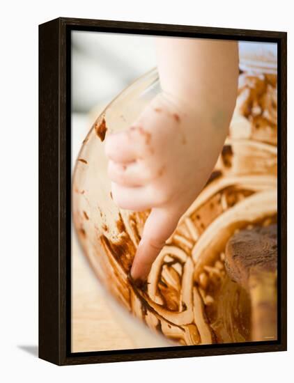 Child's Hand Scraping Mixing Bowl-Greg Elms-Framed Premier Image Canvas