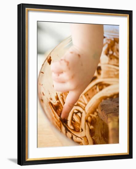 Child's Hand Scraping Mixing Bowl-Greg Elms-Framed Photographic Print