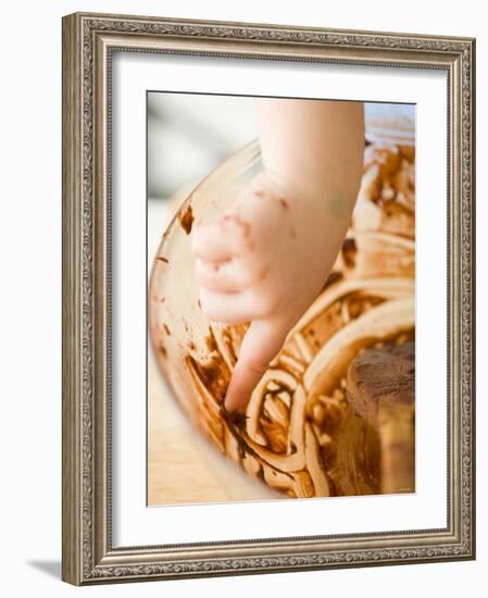 Child's Hand Scraping Mixing Bowl-Greg Elms-Framed Photographic Print