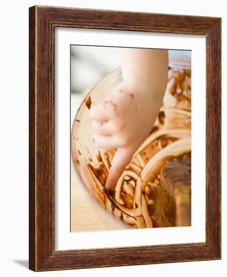 Child's Hand Scraping Mixing Bowl-Greg Elms-Framed Photographic Print