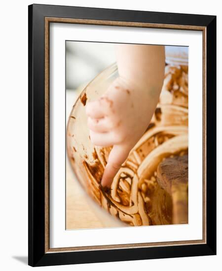 Child's Hand Scraping Mixing Bowl-Greg Elms-Framed Photographic Print