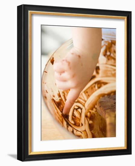 Child's Hand Scraping Mixing Bowl-Greg Elms-Framed Photographic Print