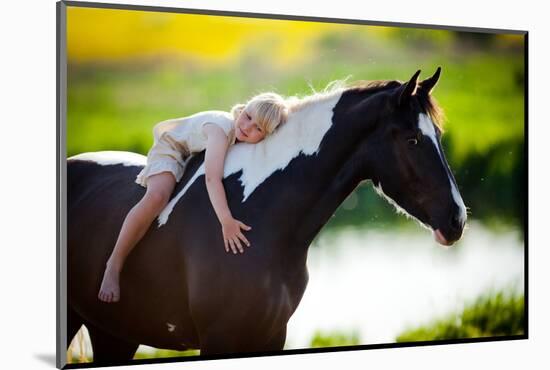 Child Sits On A Horse In Meadow Near Small River-Alexia Khruscheva-Mounted Photographic Print