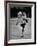 Child Skater Helen Ann Rousselle Holding Doll While Skating across the Ice-null-Framed Photographic Print