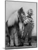 Child Standing Beside a Miniature Horse, Showing Size Comparison-Ed Clark-Mounted Photographic Print