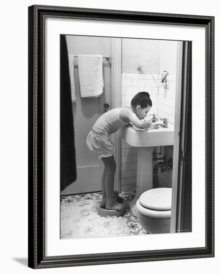 Child Star Margaret O'Brien Brushing Her Teeth-Bob Landry-Framed Premium Photographic Print