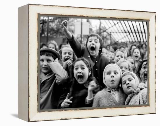 Children at a Puppet Theatre, Paris, 1963-Alfred Eisenstaedt-Framed Premier Image Canvas