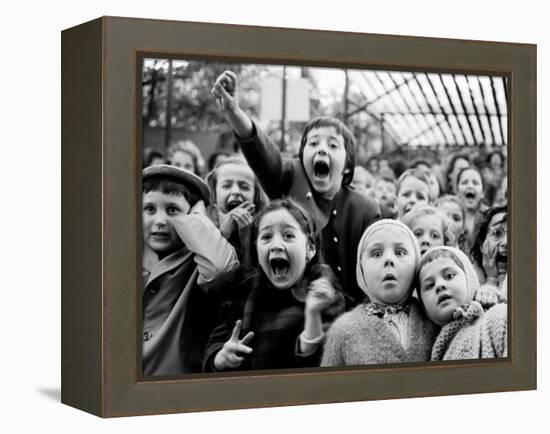 Children at a Puppet Theatre, Paris, 1963-Alfred Eisenstaedt-Framed Premier Image Canvas