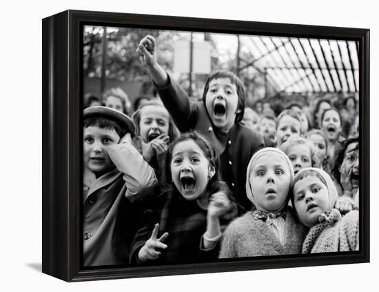 Children at a Puppet Theatre, Paris, 1963-Alfred Eisenstaedt-Framed Premier Image Canvas