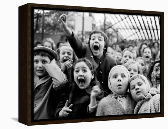 Children at a Puppet Theatre, Paris, 1963-Alfred Eisenstaedt-Framed Premier Image Canvas