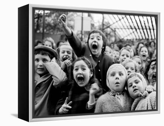 Children at a Puppet Theatre, Paris, 1963-Alfred Eisenstaedt-Framed Premier Image Canvas