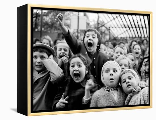 Children at a Puppet Theatre, Paris, 1963-Alfred Eisenstaedt-Framed Premier Image Canvas