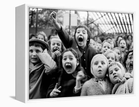 Children at a Puppet Theatre, Paris, 1963-Alfred Eisenstaedt-Framed Premier Image Canvas