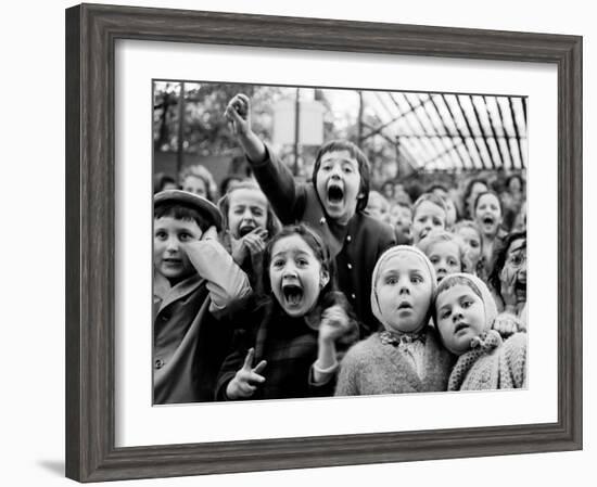 Children at a Puppet Theatre, Paris, 1963-Alfred Eisenstaedt-Framed Premium Photographic Print