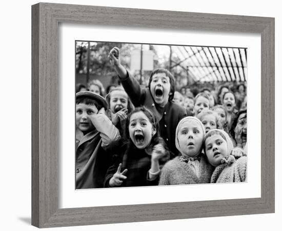 Children at a Puppet Theatre, Paris, 1963-Alfred Eisenstaedt-Framed Premium Photographic Print