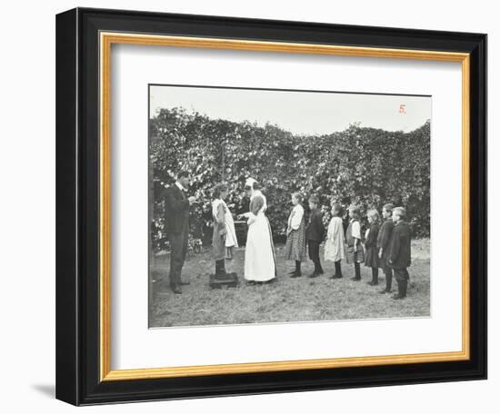 Children Being Weighed in the Garden, Montpelier House Open Air School, London, 1908-null-Framed Photographic Print