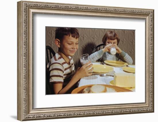 Children Drinking Milk at Dinner Table-William P. Gottlieb-Framed Photographic Print