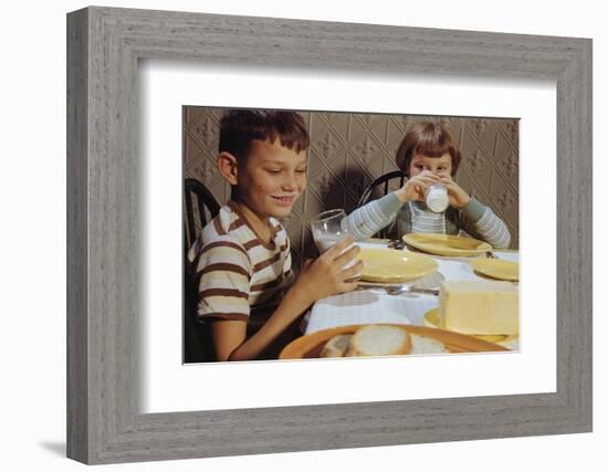 Children Drinking Milk at Dinner Table-William P. Gottlieb-Framed Photographic Print