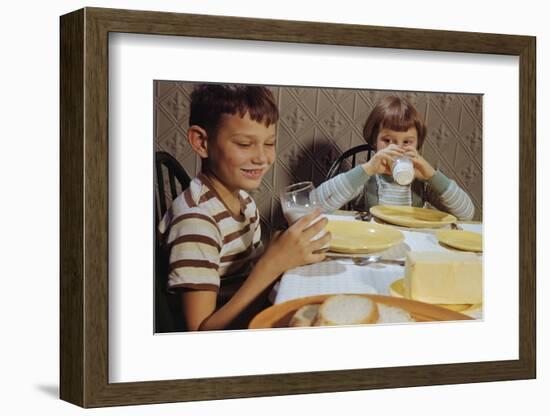 Children Drinking Milk at Dinner Table-William P. Gottlieb-Framed Photographic Print