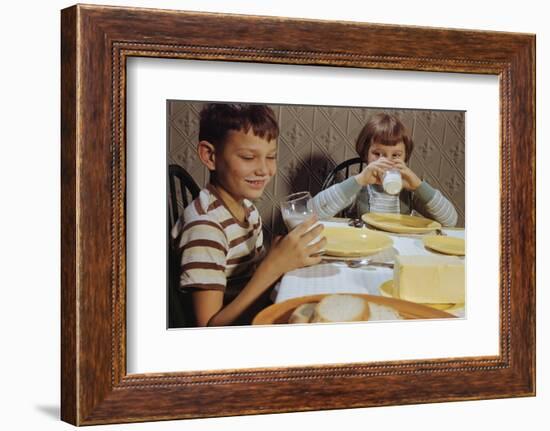 Children Drinking Milk at Dinner Table-William P. Gottlieb-Framed Photographic Print