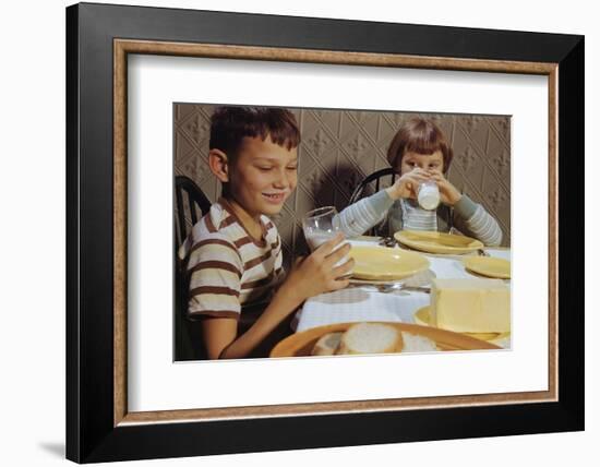 Children Drinking Milk at Dinner Table-William P. Gottlieb-Framed Photographic Print