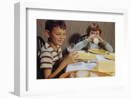 Children Drinking Milk at Dinner Table-William P. Gottlieb-Framed Photographic Print