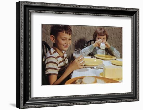 Children Drinking Milk at Dinner Table-William P. Gottlieb-Framed Photographic Print