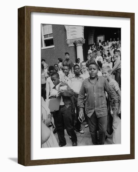 Children Emerging from School after First Day of Integrated Classes-null-Framed Photographic Print