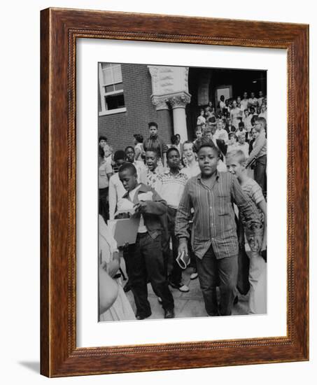 Children Emerging from School after First Day of Integrated Classes-null-Framed Photographic Print