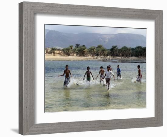 Children Enjoy a Boat Race in a Lagoon at Qalansiah, an Important Fishing Village in the Northwest-Nigel Pavitt-Framed Photographic Print