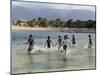 Children Enjoy a Boat Race in a Lagoon at Qalansiah, an Important Fishing Village in the Northwest-Nigel Pavitt-Mounted Photographic Print