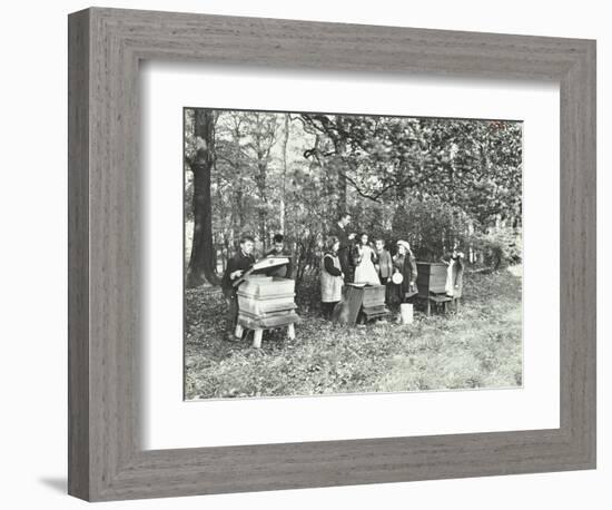 Children Feeding Bees for the Winter, Shrewsbury House Open Air School, London, 1909-null-Framed Photographic Print