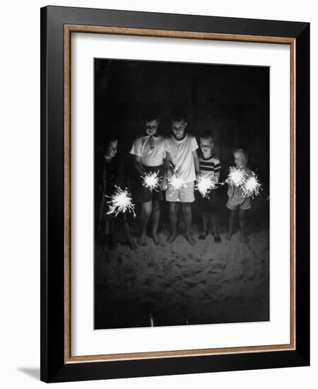 Children Holding Sparklers on a Beach-Lisa Larsen-Framed Photographic Print