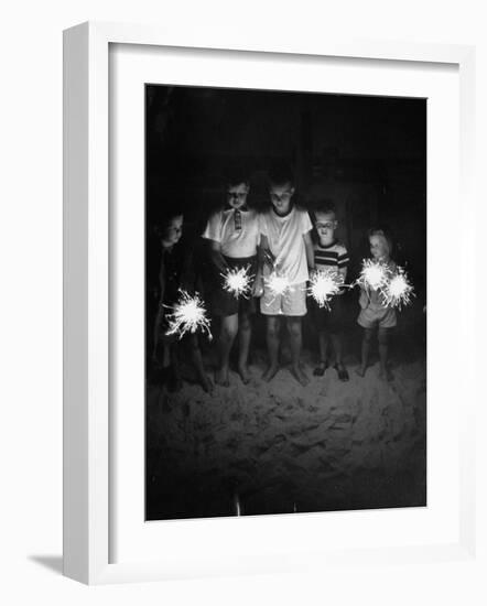 Children Holding Sparklers on a Beach-Lisa Larsen-Framed Photographic Print