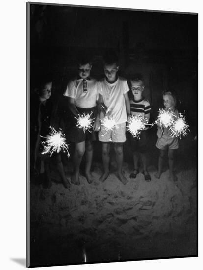 Children Holding Sparklers on a Beach-Lisa Larsen-Mounted Photographic Print