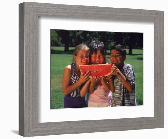 Children in Park Eating Watermelon-Mark Gibson-Framed Photographic Print