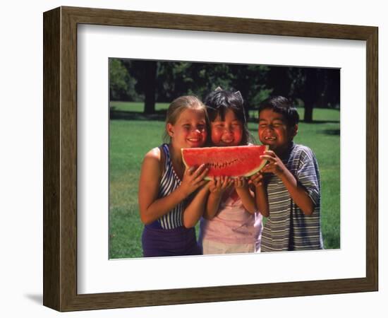 Children in Park Eating Watermelon-Mark Gibson-Framed Photographic Print