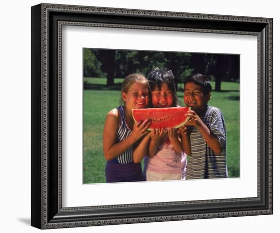 Children in Park Eating Watermelon-Mark Gibson-Framed Photographic Print