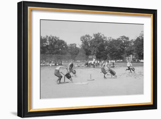 Children In Wheel Barrow Race-null-Framed Art Print